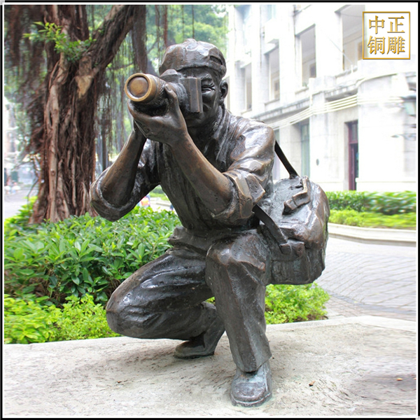 接頭拍照攝影師人物雕塑.jpg