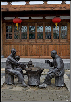 喝茶銅雕塑